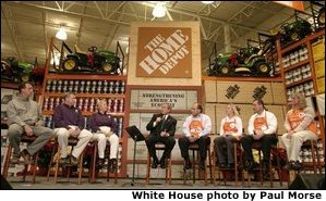 President George W. Bush participates in a conversation on the economy with employees of the Home Depot home improvement stores in Baltimore, Maryland on December 5, 2003. White House photo by Paul Morse.